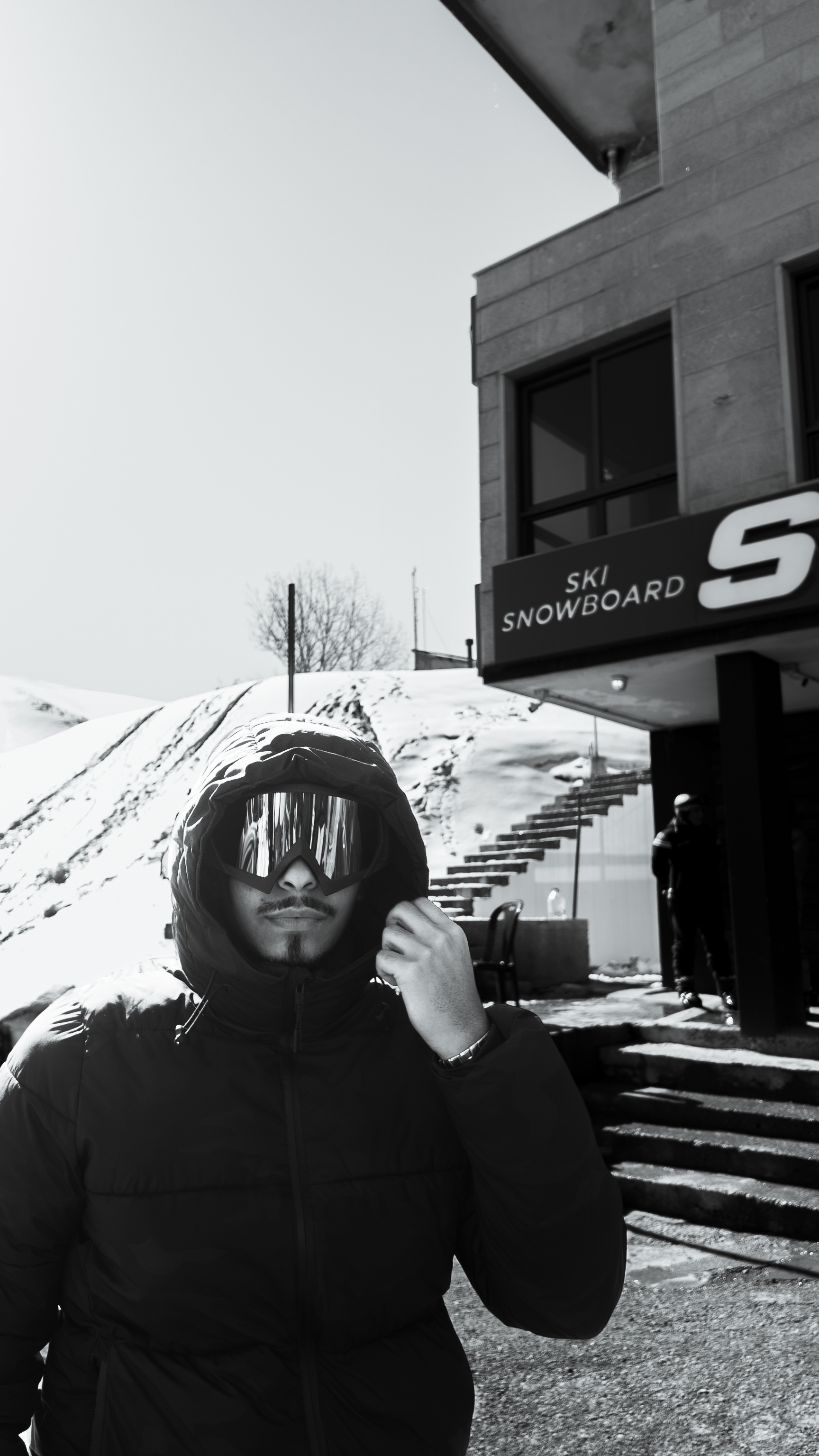 Omar Ramy in a monochrome mountain portrait