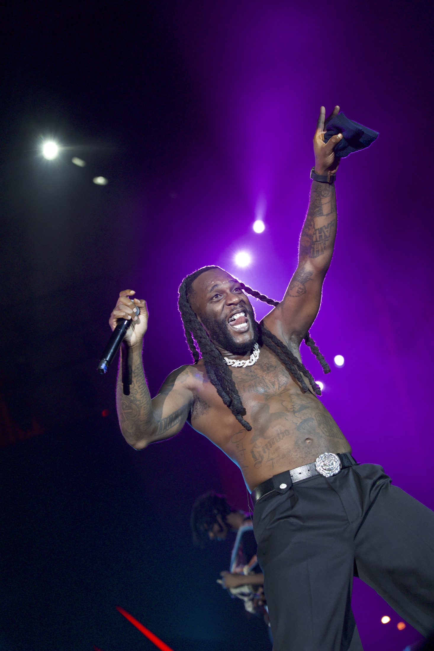 After: Burna Boy under violet concert lighting